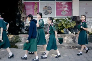 high school uniform, Can I choose my own fabric for the high school uniform? Are there any restrictions on personalized accessories? How can I ensure sustainability in high school uniforms? What if I don't agree with the chosen high school uniform? Can I suggest changes to the high school uniform design?